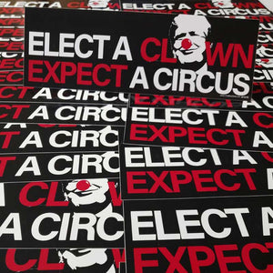 Stack of 'Elect a Clown, Expect a Circus' bumper stickers with a clown graphic.