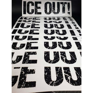 Stack of white “ICE OUT!” bumper stickers with bold, distressed black lettering, shown fresh off the print run
