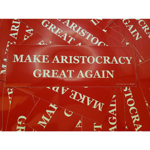 Red bumper sticker with 'Make Aristocracy Great Again' text on a red background