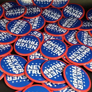 Collection of blue and red 'Never Trump' buttons.