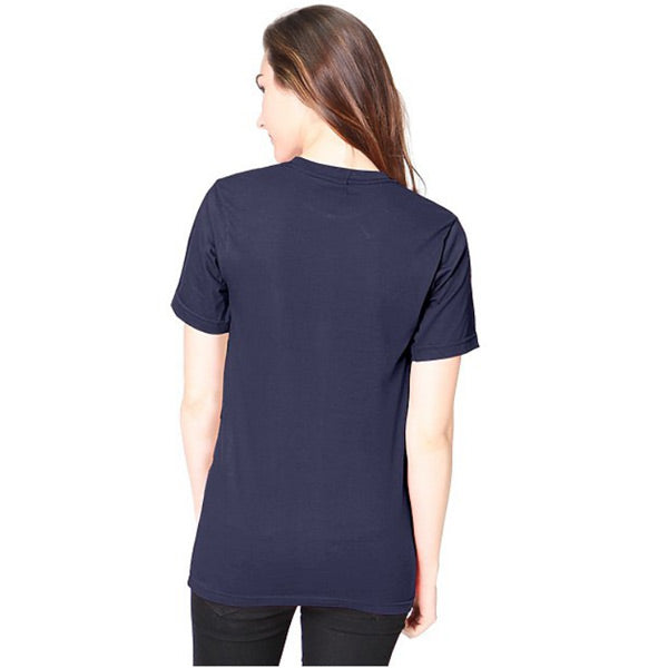 Woman showing the back of a Royal Apparel 5051 t-shirt