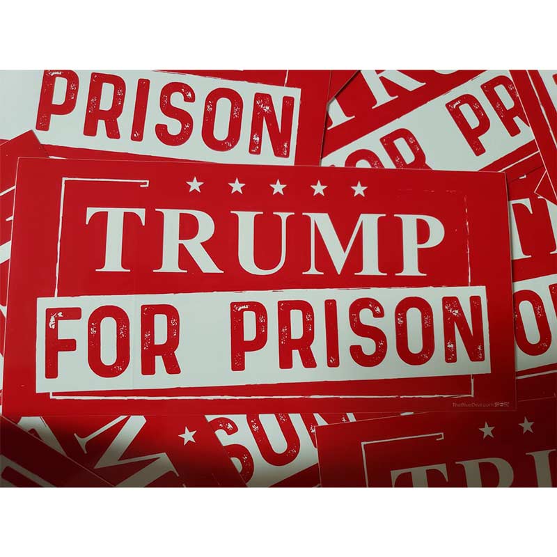 Red and white political stickers with text on a white background